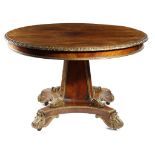 λ A ROSEWOOD AND GILT COMPOSITION CENTRE TABLE 19TH CENTURY the circular fixed top with an egg and