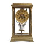 A FRENCH BRASS FOUR GLASS MANTEL CLOCK LATE 19TH / EARLY 20TH CENTURY the brass eight day movement