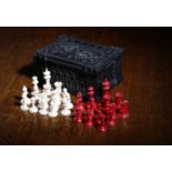 λ A VICTORIAN IVORY STAUNTON PATTERN CHESS SET BY JAQUES, C.1870 natural and stained red, the