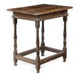 AN OAK AND WALNUT CENTRE TABLE EARLY 18TH CENTURY top and base probably associated, the walnut