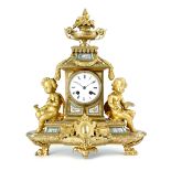 A NAPOLEON III ORMOLU AND PORCELAIN MOUNTED MANTEL CLOCK BY J. EDMONDS, C.1870 in Louis XVI style,