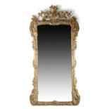 A LARGE GILTWOOD WALL MIRROR LATE 18TH / EARLY 19TH CENTURY the rectangular plate within a moulded