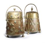 TWO SIMILAR DUTCH COPPER AND BRASS DOOFPOTS 19TH CENTURY each with a lift-off cover, one with an urn