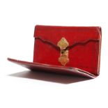 A FRENCH RED MOROCCO LEATHER AND GOLD MOUNTED PURSE THIRD QUARTER 18TH CENTURY the interior with a