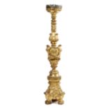 AN ITALIAN GILTWOOD ALTAR CANDLESTICK PROBABLY 18TH CENTURY the top with a tin corona drip-pan,