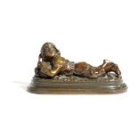 A FRENCH BRONZE FIGURE OF A RECUMBENT BOY BY JEAN GARNIER (FRENCH 1853-1910) he holds a flue