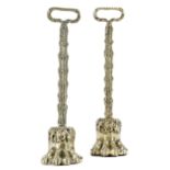 A MATCHED PAIR OF 19TH CENTURY BRASS LIONS PAW DOORSTOPS FIRST HALF 19TH CENTURY each with a foliate