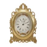 AN ORMOLU STRUTT TIMEPIECE CLOCK IN THE MANNER OF THOMAS COLE, C.1870 with an eight day movement,