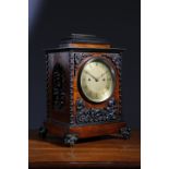 λ A SMALL WILLIAM IV ROSEWOOD AND PATINATED BRONZE BRACKET CLOCK BY FRODSHAM & BAKER, C.1830-35