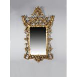 AN IRISH GILTWOOD WALL MIRROR IN GEORGE II STYLE THIRD QUARTER 19TH CENTURY the arched rectangular