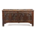 A CHARLES II OAK QUADRUPLE PANELLED COFFER PROBABLY WEST COUNTRY, C.1660 the hinged top revealing
