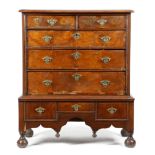 A WALNUT CHEST ON STAND EARLY 18TH CENTURY AND LATER the top with a moulded edge, above two short