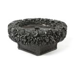 AN ANGLO-INDIAN EBONY CENTREPIECE MID-19TH CENTURY carved in the form of a basket of flowers, the