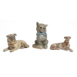 THREE GERMAN POLYCHROME DECORATED TERRACOTTA ANIMALS LATE 19TH CENTURY AND LATER comprising: a