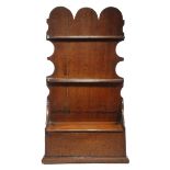 A GEORGE II OAK FRET-FRAME HANGING SPOON RACK MID-18TH CENTURY with two tiers, each pierced with six