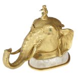 A VICTORIAN GILT BRONZE ELEPHANT HEAD INKWELL C.1860-70 the filigree decorated hinged lid with a