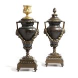 A PAIR OF BRONZE AND EBONISED WOOD CASSOLETTES FIRST HALF 19TH CENTURY each with a reversible top