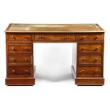 A VICTORIAN MAHOGANY TWIN PEDESTAL DESK C.1860 the top with a moulded edge inset with a gilt