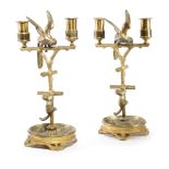 A PAIR OF FRENCH ORMOLU NOVELTY CANDLESTICKS LAST QUARTER 19TH CENTURY each modelled with a cat