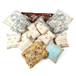 A COLLECTION OF CUSHIONS 19TH CENTURY AND LATER including: a set of seven French silk examples and a