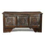 AN OAK COFFER LATE 17TH / EARLY 18TH CENTURY the hinged top revealing an interior with a lidded