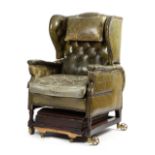 A FOOT'S PATENT LEATHER UPHOLSTERED METAMORPHIC WING ARMCHAIR LATE VICTORIAN, C.1900 with button