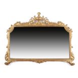 A GILTWOOD OVERMANTEL MIRROR IN GEORGE III STYLE EARLY 20TH CENTURY the shaped plate within a leaf