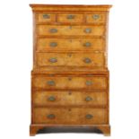 A GEORGE II WALNUT CHEST ON CHEST MID-18TH CENTURY with three short and six long cross and feather