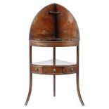 A GEORGE III MAHOGANY CORNER WASHSTAND C.1800-1810 with reeded decoration, the gallery top with a