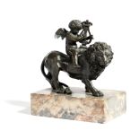 A BRONZE GRAND TOUR GROUP OF A CHERUB RIDING A LION ITALIAN, FIRST HALF 19TH CENTURY the winged