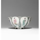 A CHINESE FAMILLE ROSE MOULDED BOWL YONGZHENG 1723-35 The U-shaped body moulded as a flowerhead,