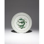 A CHINESE IMPERIAL GREEN-ENAMELLED 'DRAGON' DISH SIX CHARACTER GUANGXU MARK AND OF THE PERIOD 1875-