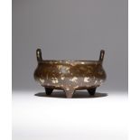 A CHINESE GOLD-SPLASHED TRIPOD INCENSE BURNER QING DYNASTY The compressed body rising to a short