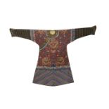 A CHINESE BROWN-GROUND KESI 'NINE DRAGON' ROBE QING DYNASTY Finely worked in gold threads with