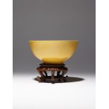 A CHINESE IMPERIAL YELLOW GLAZED BOWL SIX CHARACTER KANGXI MARK AND OF THE PERIOD 1662-1722 The U-
