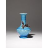 A SMALL CHINESE TURQUOISE GLAZED 'CHILONG' VASE YONGZHENG 1723-35 Raised on a spread foot and