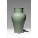 A CHINESE CELADON GLAZED VASE 18TH/19TH CENTURY The ovoid body tapering towards the foot and
