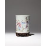 A CHINESE FAMILLE ROSE CYLINDRICAL BRUSHPOT, BITONG YONGZHENG OR LATER Painted to the exterior with