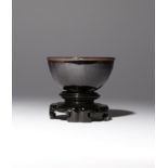 A CHINESE JIAN-TYPE TEA BOWL PROBABLY SONG DYNASTY The deep rounded sides decorated in a thick black