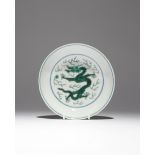A CHINESE IMPERIAL GREEN-ENAMELLED 'DRAGON' DISH SIX CHARACTER DAOGUANG MARK AND OF THE PERIOD