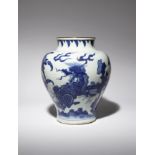 A CHINESE BLUE AND WHITE 'MYTHICAL BEASTS' BALUSTER VASE SHUNZHI 1644-61 Painted with a qilin,