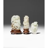 TWO CHINESE JADE CARVINGS OF LIU HAI AND A CARVING OF A BOY 18TH/19TH CENTURY The pale celadon