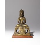 A CHINESE GILT-BRONZE FIGURE OF AMITAYUS 18TH CENTURY He sits in dhyanasana upon a rectangular