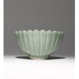 A GOOD CHINESE LONGQUAN CELADON 'CHRYSANTHEMUM' BOWL MING DYNASTY The deep fluted sides moulded as