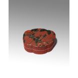 A CHINESE THREE-COLOUR CINNABAR LACQUER 'PEACHES' BOX AND COVER 18TH/EARLY 19TH CENTURY Carved in