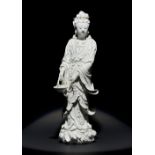 A LARGE CHINESE BLANC DE CHINE FIGURE OF GUANYIN 18TH CENTURY The bodhisattva depicted standing tall