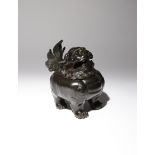 A CHINESE BRONZE 'LION DOG' INCENSE BURNER AND COVER 17TH CENTURY The stocky beast cast standing