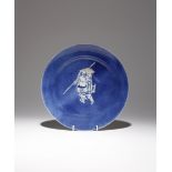 A RARE CHINESE UNDERGLAZE BLUE AND RED POWDER BLUE-GROUND DISH KANGXI 1662-1722 Painted to the