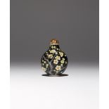 A RARE CHINESE ENAMELLED GLASS 'PRUNUS' SNUFF BOTTLE 18TH CENTURY OR LATER