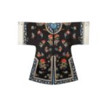 A CHINESE BLACK-GROUND EMBROIDERED SILK ROBE LATE QING DYNASTY Decorated with sprays of many
